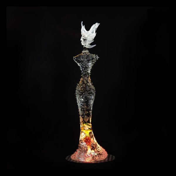 Lady in Clear, glass sculpture by Kjell Engman for Kosta Boda. Buy glass art online. Glass for sale online. Art for sale online. Norfolk art gallery, Riverside Art and Glass, Wroxham, East Anglia, United Kingdom. Gallery in the Lanes, Norwich.